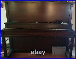 1939 Upright Wooden piano with all keys. Plays just fine. No scratches on wood