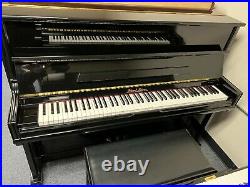 2000 Perl River Upright Piano