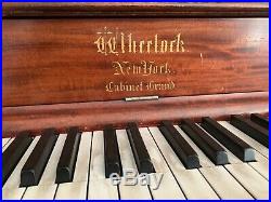 Antique Upright Grand Piano. Wheelock. Stunning details in woodworking