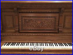 Antique Upright Piano in Oak Cabinet