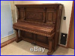 Antique Upright Piano in Oak Cabinet