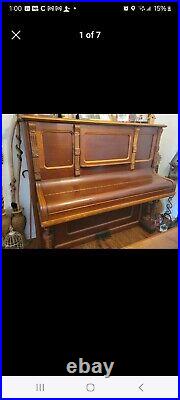 Antique hoffman standin piano in wonderful condition and all original parts