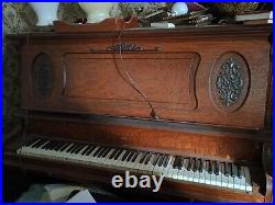 Antique piano Ludwig & company stand up piano antique Great condition