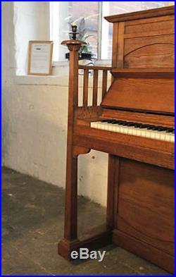 Arts and Crafts, Bluthner upright piano with an oak case. 12 month warranty