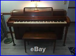 BALDWIN ACROSONIC PIANO with stool and storage- looks good and plays good