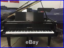 Baldwin M baby grand piano
