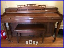 Baldwin Spinet Piano and storage bench, walnut wood, excellent condition