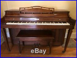 Baldwin Spinet Piano and storage bench, walnut wood, excellent condition