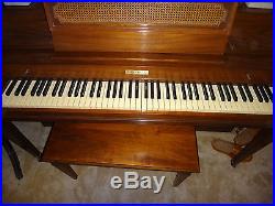 Baldwin Upright Piano with Matching Bench seat Pecan Wood 1970