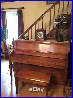 Baldwin upright grand piano with bench Excellent condition! Works great