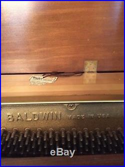 Baldwin upright grand piano with bench Excellent condition! Works great