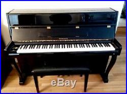 Black Lacquer Samick Upright Piano with matching bench slightly used 1 owner