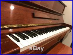 Boston by Steinway and Sons UP-118E WP Vertical Walnut Polished Piano