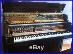 Charles R. Walter mahogany console piano