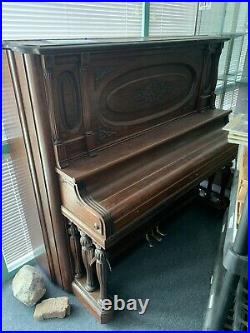 Circa 1906 upright Harrington Grand Piano
