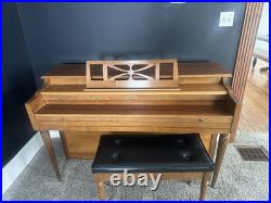 Currier piano with bench