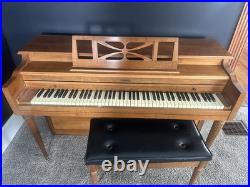 Currier piano with bench