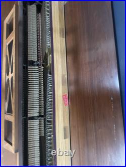 Currier piano with bench