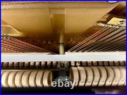Eterna ER-C10 Upright Piano made by Yamaha 43 1/2 Polished Ebony