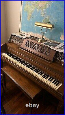 Everett Spinet Piano with Bench, honey wood, on wheels