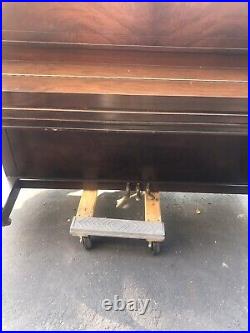 Howard Upright Piano by Baldwin, good used condition, great piece Sounds Good