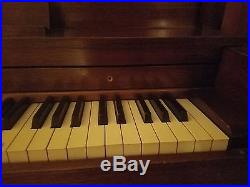 Howard Upright Piano by Baldwin, good used condition, great piece for any room