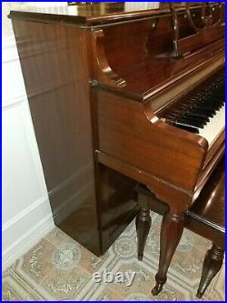 Jacobs Brothers piano with a bench excellent condition