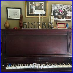 Jewett antique upright piano, in good condition. Needs tuning and polishing