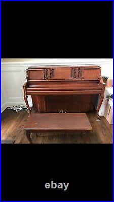 Kimball upright piano including bench and sheet music