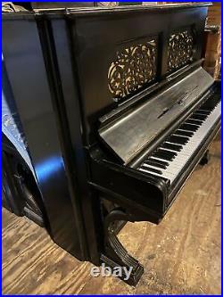 Lot 071 Steinway & Sons upright grand piano 56