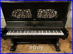 Lot 071 Steinway & Sons upright grand piano 56