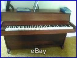 Melodigrand upright piano, used, plays well. Great starter