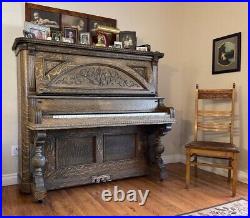 Musical instruments, antique upright restored piano, grade III carved tiger oak