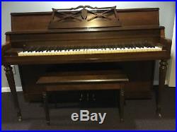 Piano and bench, Janssen upright, walnut, used, good condition. Needs tuning