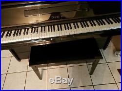 Piano, upright. Young Chang model U-107. Black Lacquer. Excellent condition