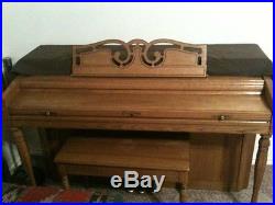 Rudolph Wurlitzer upright piano with bench