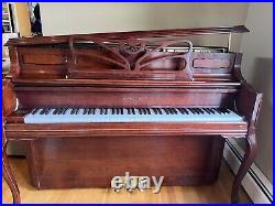 Samick upright piano, with matching bench