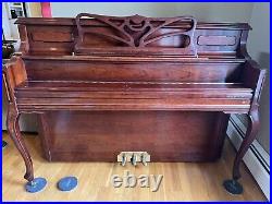 Samick upright piano, with matching bench