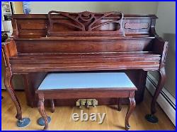 Samick upright piano, with matching bench