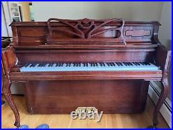 Samick upright piano, with matching bench