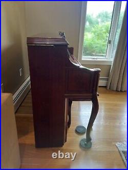 Samick upright piano, with matching bench