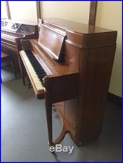 Steinway Console Studio Piano with cherry finish & traditional style