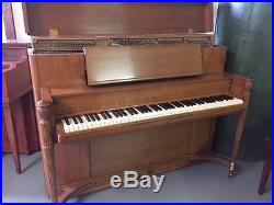 Steinway Console Studio Piano with cherry finish & traditional style