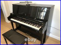 Steinway Essex upright piano