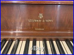 Steinway & Sons upright piano model 100 42tall