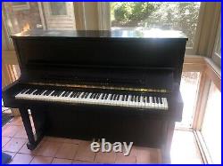 Steinway upright Piano elegant ebony case and matching adjustable bench