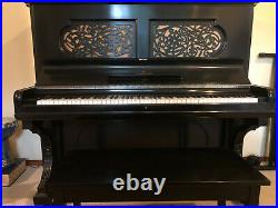 Steinway upright grand piano