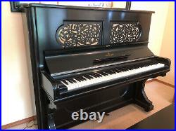 Steinway upright grand piano
