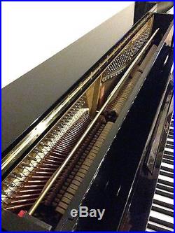 This is a 2002 Boston Upright Piano, Model UP-118E