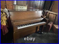 This item is a used Kimball School Upright Piano that is ideal for the home